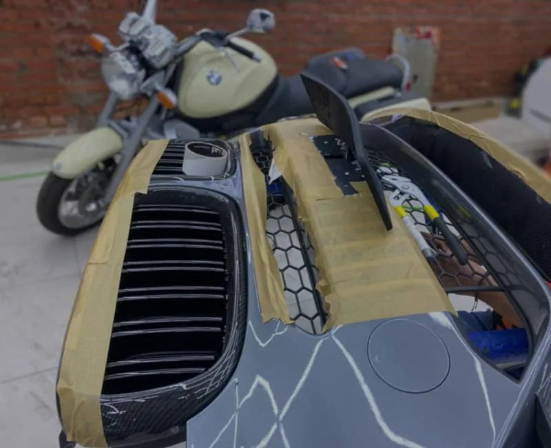 Подготовка бампера BMW к установке откидной рамки